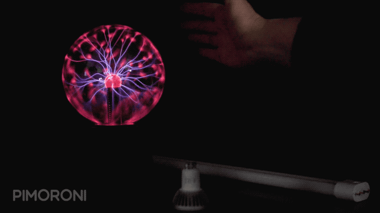 plasma ball being touched by hand